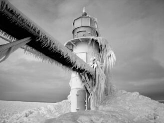 frozen tower under gray sky